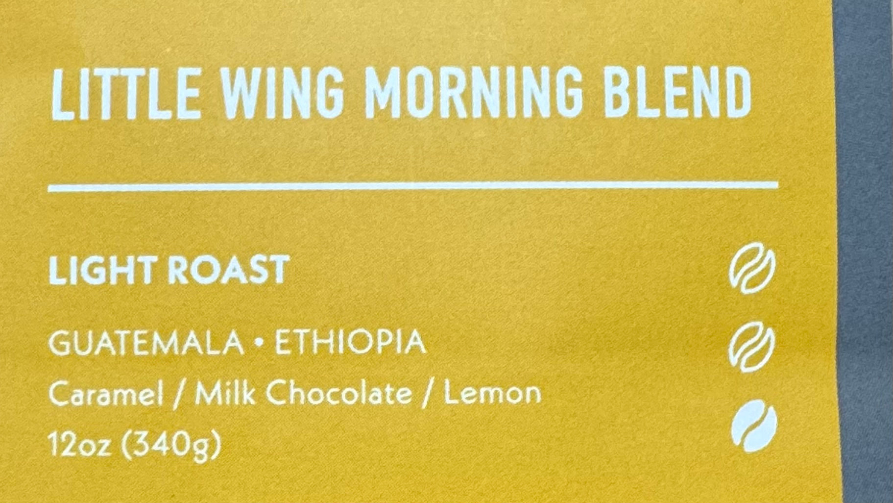 The Little Wing Morning Blend by My Store is a light roast coffee in a yellow label, crafted from top Guatemalan and Ethiopian beans with caramel, milk chocolate, and lemon notes; available in 12oz (340g).