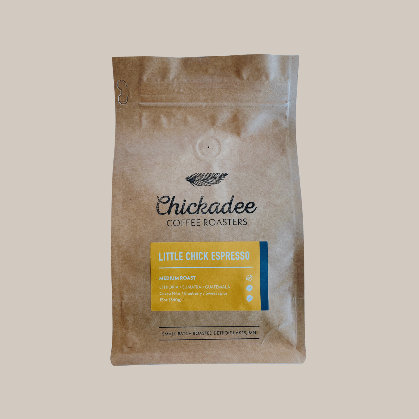 A brown bag of Chickadee Coffee Roasters “Little Chick Espresso” with a yellow label describes its medium roast blend from Ethiopia, Sumatra, and Guatemala—ideal for the Variety Bundle (4 Pack).